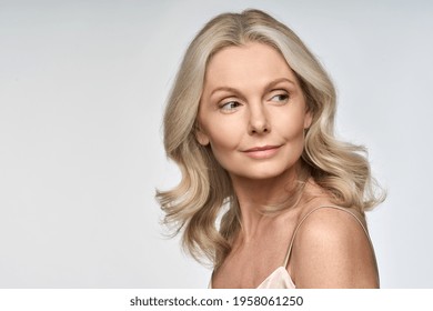 Portrait Of Adult 50 Years Old Model Woman Isolated On White Background Advertising Skin Care Spa Treatment. Mid Age Tightening Rejuvenating Face And Body Care Cosmetics Concept.