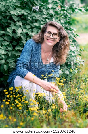 Similar – Foto Bild Junge Frau sitzend im Wald.