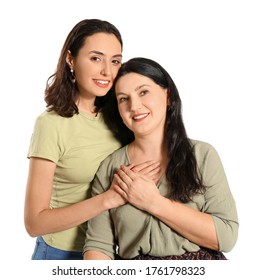 Portrait Of Adult Daughter And Her Mother On White Background