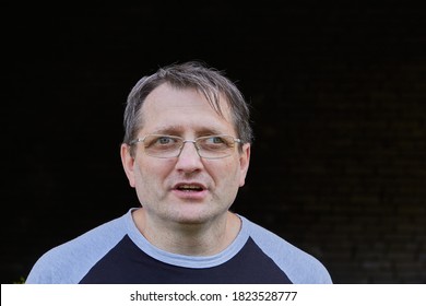 Portrait Of An Adult Male Face, Strabismus Or Exotropia