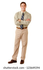 Portrait Of An Adult Man Wearing Khakis And A Shirt And Tie Looking At Camera Isolated On A White Background