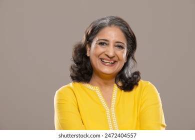 PORTRAIT OF AN ADULT WOMAN LAUGHING WHILE LOOKING AT CAMERA - Powered by Shutterstock