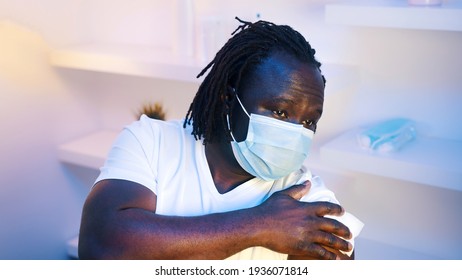 Portrait Of African American Black Man Getting Vaccine Against Coronavirus. High Quality Photo