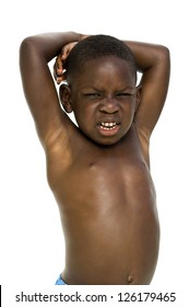 Portrait Of African American Boy Standing On White Background