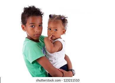 Portrait Of A African American Brother And Sister, Isolated On White Background