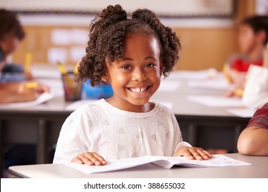 Portrait Of African American Elementary School Girl In Class