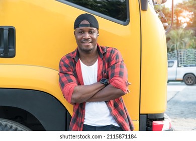 Portrait African American Men Happy Smiling Confident Positive Standing Arms Crossed Near Lorry. Young Man Owner Truck Driver In Business Long Transport In Plaid Shirt Smile Satisfied With Service.