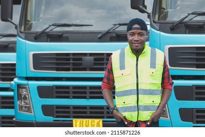 Portrait African American Men Happy Smiling Confident Positive Standing Near Lorry. Young Man Owner Truck Driver In Business Long Transport In Reflective Safety Vest Smile Satisfied With Service.