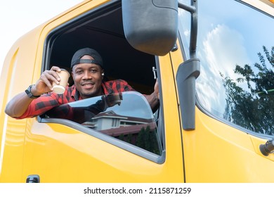 Portrait African American Men Happy Smiling Confident Positive Sitting In Semi-truck. Young Man Professional Truck Driver In Business Long Transport Holding Coffee Cup Smile Satisfied With Service.