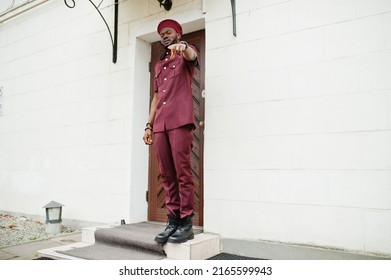 Portrait Of African American Military Man In Red Uniform And Beret.