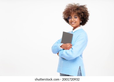 Portrait Of African American Teen Girl, High School Or Online Course Student Holding Closed Laptop, Isolated On Gray Background