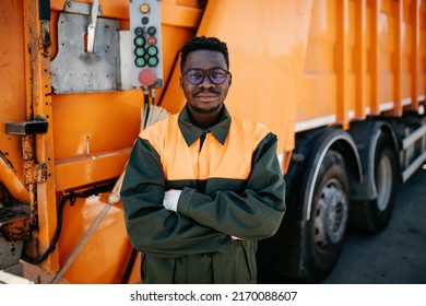 Portrait Of A African American Worker Of The City Utility Company. Garbage Collector.