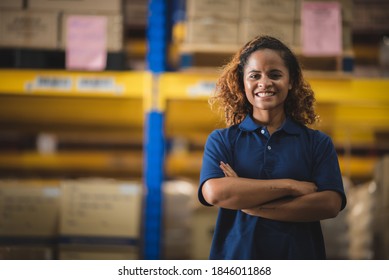 Portrait of African American worker in warehouse, International export business concept - Powered by Shutterstock