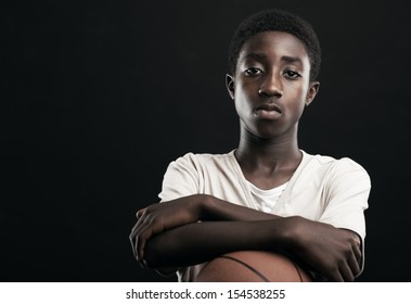 Portrait Of African Boy With Basket Ball