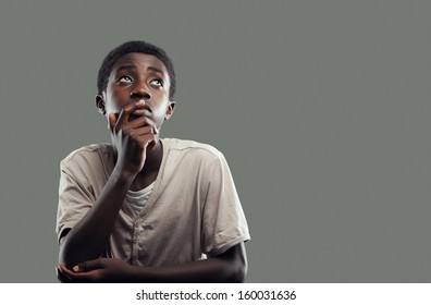 Portrait Of An African Boy Looking Up