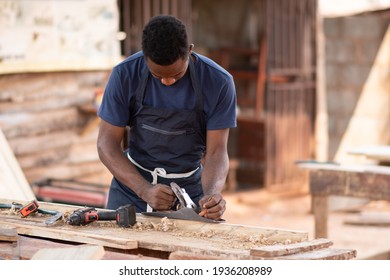portrait of an african carpenter working