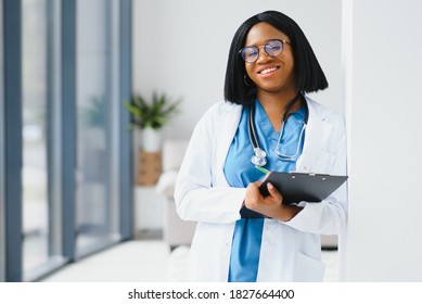 Portrait Smiling Female Doctor Wearing White Stock Photo 1323802721 ...