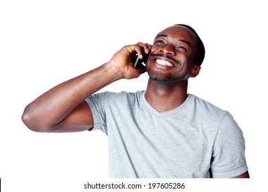 Portrait Of African Man Talking On The Phone Isolated On A White Background