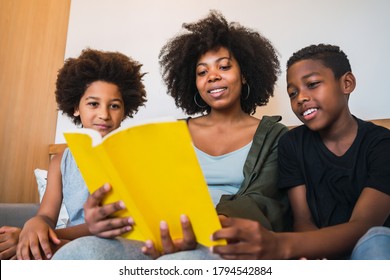 Happy African Mother Reading Book Her Stock Photo 23016214 | Shutterstock