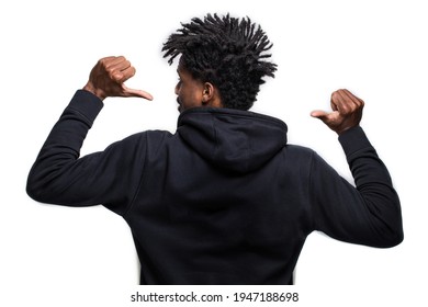 A Portrait Of An Afro-American Athletic Young Man With Dreads, In A Black Hoodie, With The Hands Up, Isolated On The White Background