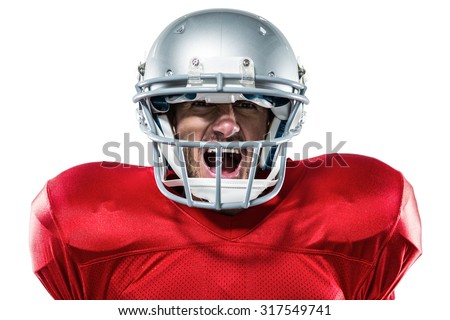 Portrait of aggressive American football player in red jersey screaming against white background
