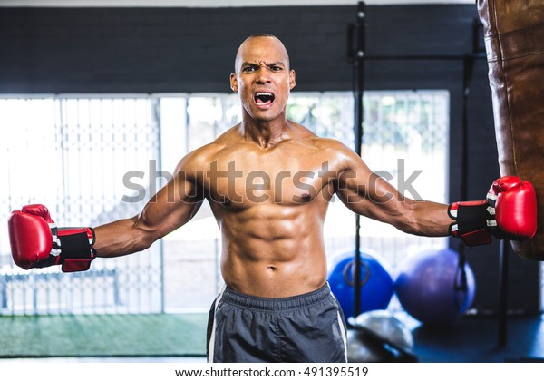 Portrait Aggressive Shirtless Boxer Standing Gym Stock 