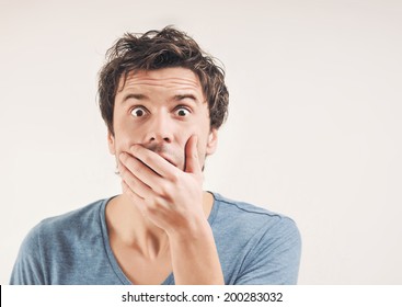 Portrait Of Amazed Man In Studio