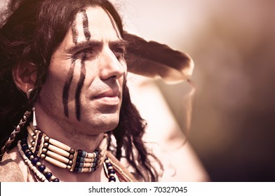 Portrait of american indian in national dress