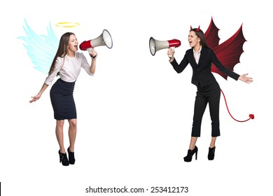 Portrait of angel and devil girls with megaphone and copyspace between them on white background
