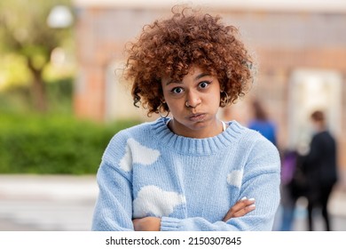 Portrait Of Angry Or Furious Girl In The Street