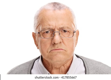 Portrait of an angry senior frowning and looking at the camera isolated on white background