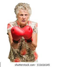 Portrait Of Angry Senior Woman Boxer Isolated Over White Background