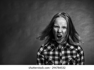 Portrait Of Angry Teen Girl