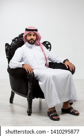 Portrait Of An Arab Man Sitting Down.