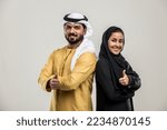 Portrait of arabic couple with traditional clothes in a studio