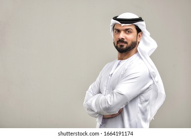 Portrait of arabic man with kandora in a studio