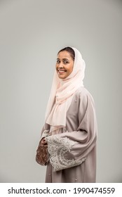 Portrait of arabic woman with abaya dress in a studio
