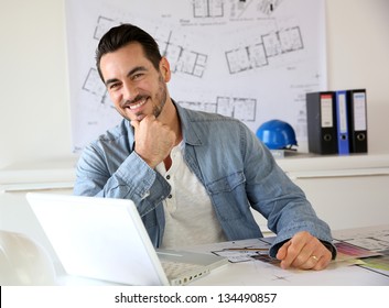 Portrait Of Architect Working On Project