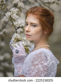 Portrait Of An Aristocratic Girl In White Lace Gloves In The Garden