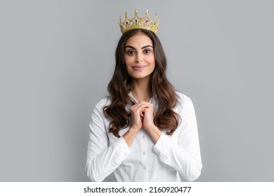 Portrait Of Arrogance Woman With Golden Crown On Head, Leadership And Success. Attractive Rich Arrogant Girl Wearing Crown Isolated Over Gray Background.