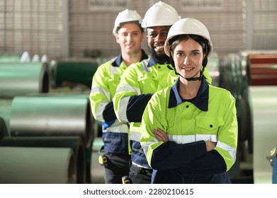 Portrait Asia engineer woman with team and metal sheet background - Shutterstock ID 2280210615