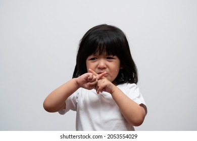 Portrait Of Asian Angry, Sad And Cry Little Girl On White Isolated Background, The Emotion Of A Child When Tantrum, Expression Grumpy Emotion. Kid Emotional Control Concept