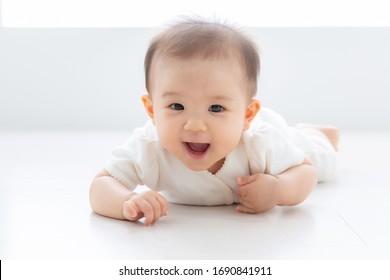 Portrait Of Asian Baby Lying