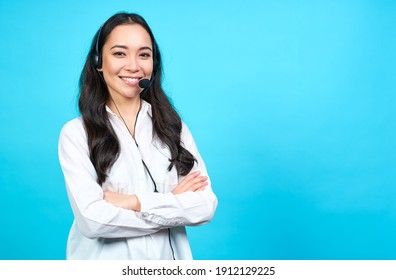 Portrait of Asian beautiful smiling woman customer support phone operator in office space banner background and copy space.Concept call center job service. Helping, answering, consulting. Copy space.