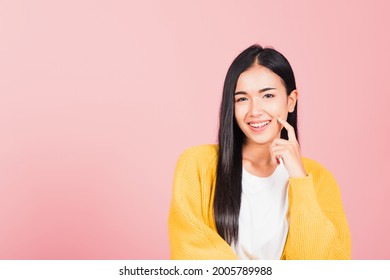 Portrait Asian Beautiful Young Woman Smiling Standing Chin Handle Relaxed Thinking About Something About The Question Studio Shot Isolated On Pink Background, Thai Female Idea Think With Copy Space