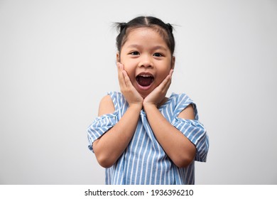 Portrait Of Asian Child 5 Year Old And To Collect Hair And A Big Smile On Isolated White Background, She Is Happiness, Radiance In Youth