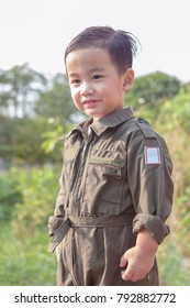Portrait Of Asian Children Wearing Airforce Pilot Suit Toothy Smiling Face
