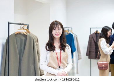 Portrait Of Asian Clothing Shop Staff