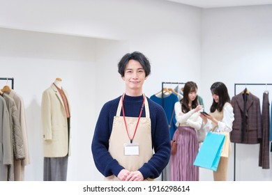 Portrait Of Asian Clothing Shop Staff