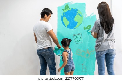 Portrait of asian family father and mother with little girl look at paint saving clean energy earth globe world environment green eco friendly.campaign save the earth and earth Day 22 April - Powered by Shutterstock